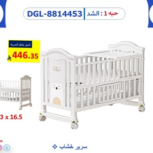 سرير اطفال خشبي مع مساحة تخزين
